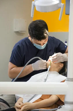 Dentist treating a patient
